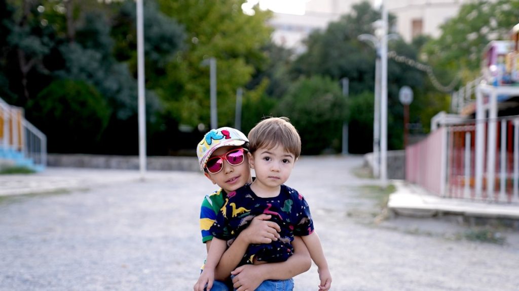 2 Young boy in the park and walking and playing